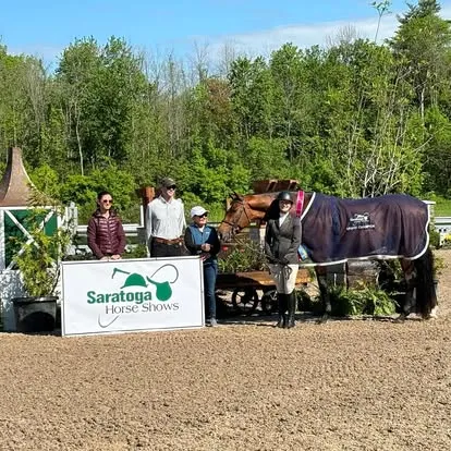Riders and horse in blanket at Saratoga Horse Shows presentation